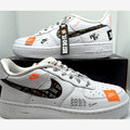 Nike Air Force 1 Low Just Do It in white with orange accents